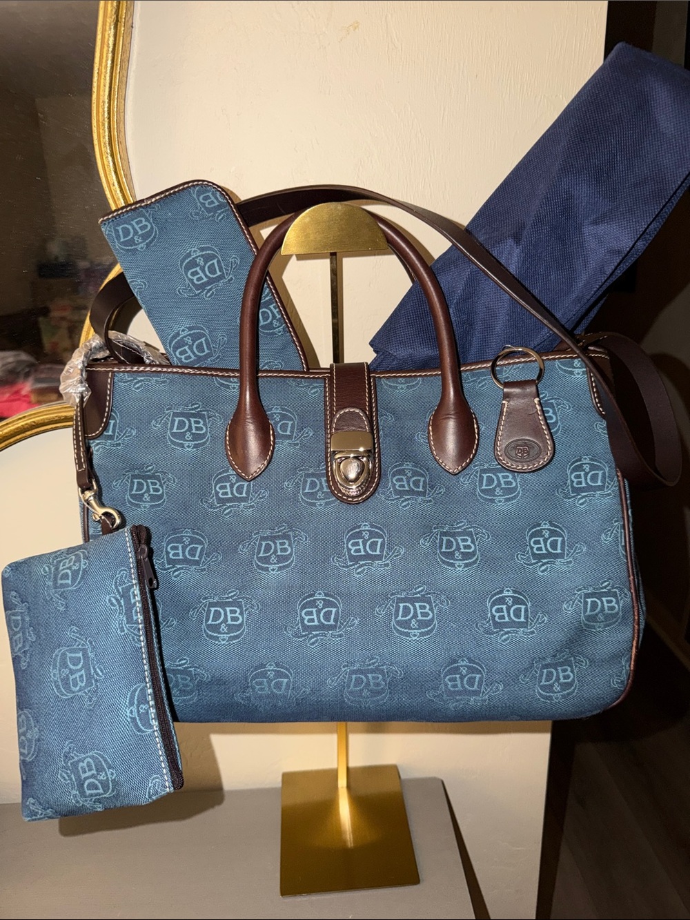 Dooney & Bourke Blue Canvas Duffel with Brown Leather Trim